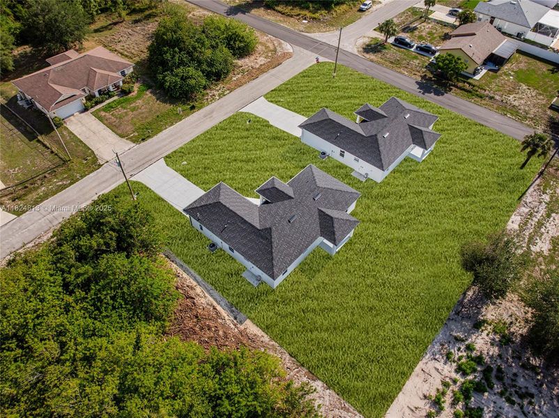 Front exterior of a new home in , Lehigh Acres, FL, highlighting curb appeal (Image 1). Front exterior of a new home in , Lehigh Acres, FL, highlighting curb appeal (Image 1).