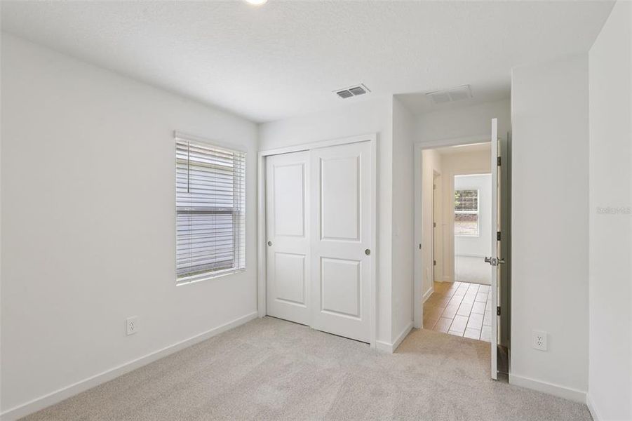 Spacious, unfurnished interior of a new home in Colbert Landings, Palm Coast (Image 25).
