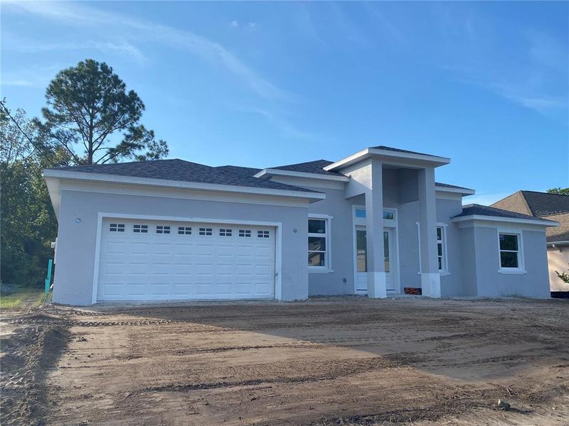 Exterior details and patio area of a home in , Palm Coast (Image 3). Exterior details and patio area of a home in , Palm Coast (Image 3).