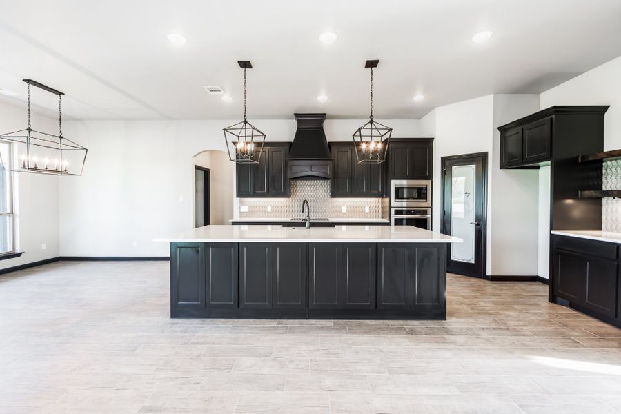 Representative furnished interior of a home built from the The Bennett by Doug Parr Custom Homes in Kessler Farms, Brock (Image 5).