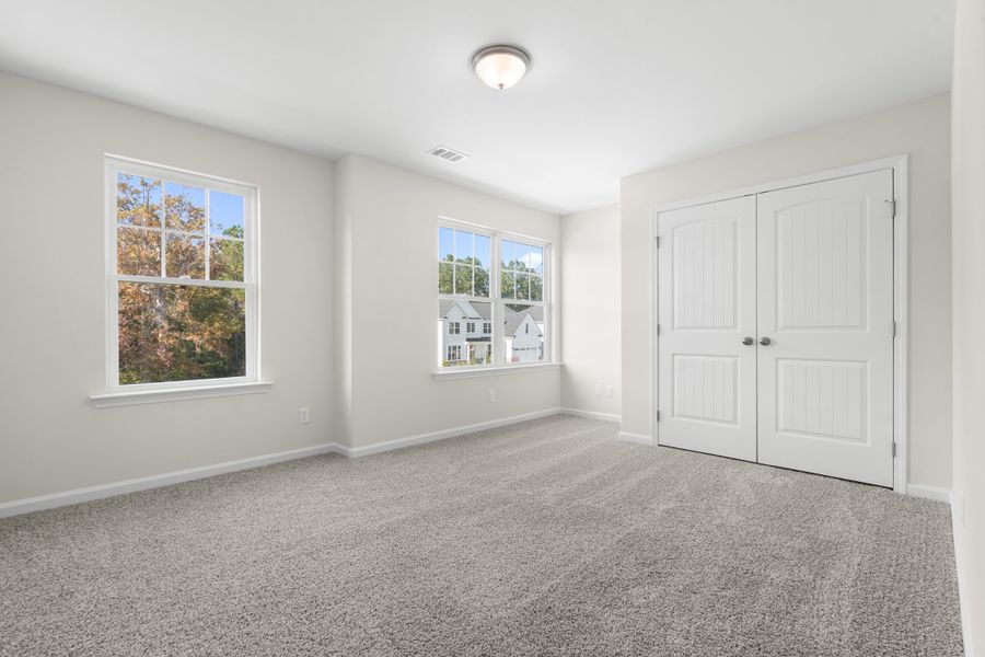 Representative unfurnished interior of a home built from the The Dalton by Smith Family Homes in Ramsey Landing, Rincon (Image 24).