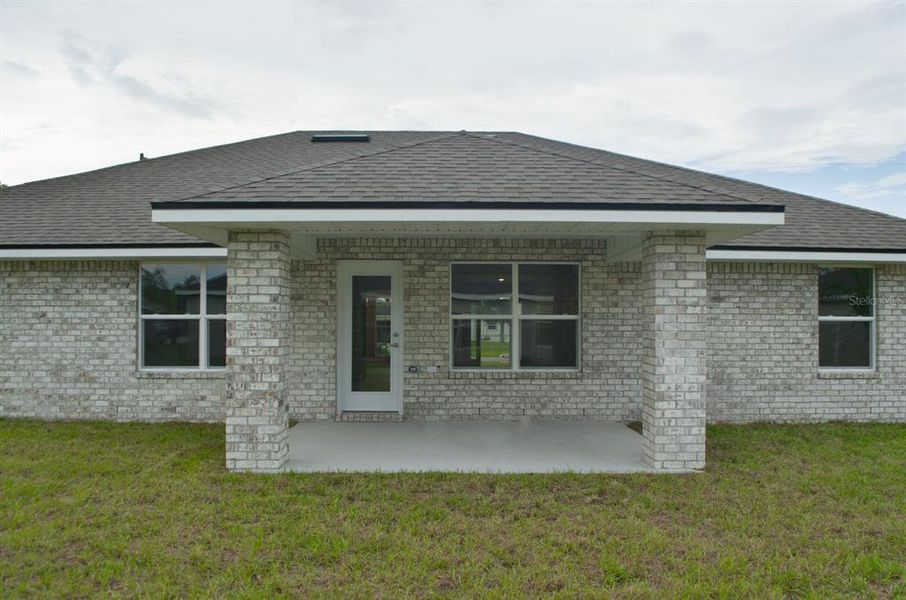 Exterior details and patio area of a home in Palm Coast, Palm Coast (Image 3).
