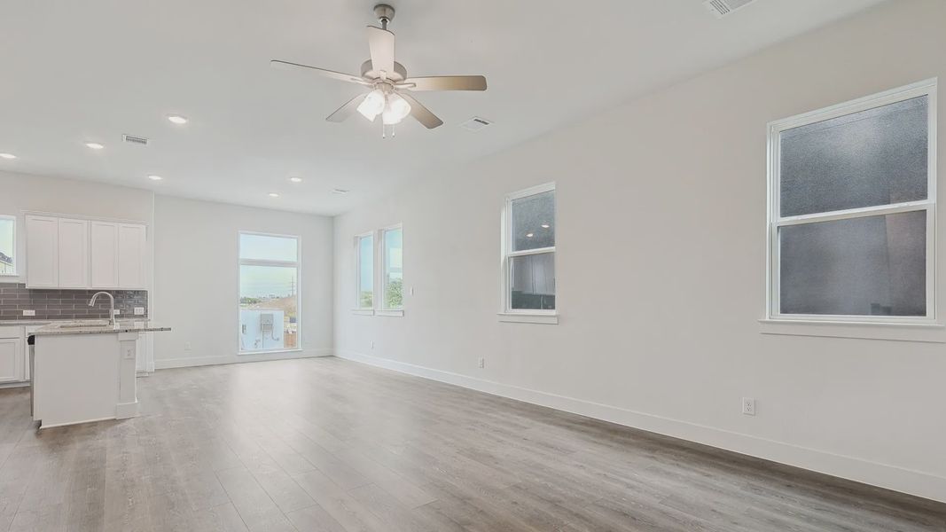 Furnished interior view inside a new home in Collin Creek, Plano (Image 13).