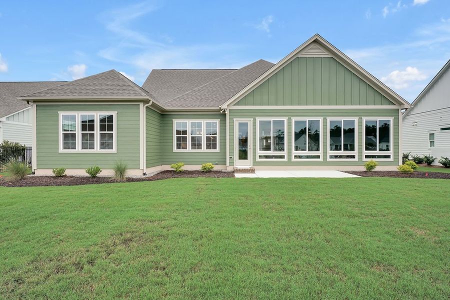 Front exterior of a new home in Brunswick Forest, Leland, NC, highlighting curb appeal (Image 18).