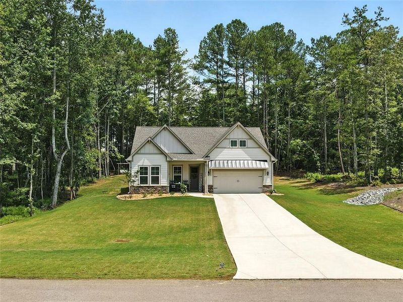 Front exterior of a new home in , Ellijay, GA, highlighting curb appeal (Image 1).