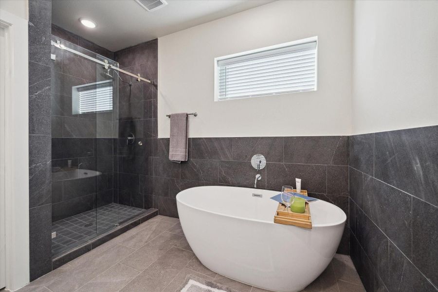 Representative photo showing the community’s model home primary bathroom. Layout and selections may vary.
