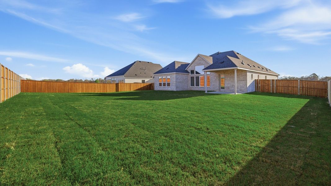 Exterior details and patio area of a home in Lakeshore Bluffs, Shady Shores (Image 26).