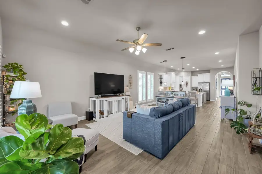 Furnished interior view inside a new home in Grand Central Park 45', Conroe (Image 12).