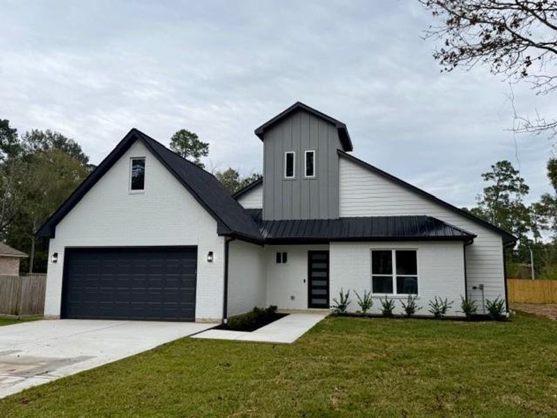 Front exterior of a new home in , Magnolia, TX, highlighting curb appeal (Image 20). Front exterior of a new home in , Magnolia, TX, highlighting curb appeal (Image 20).