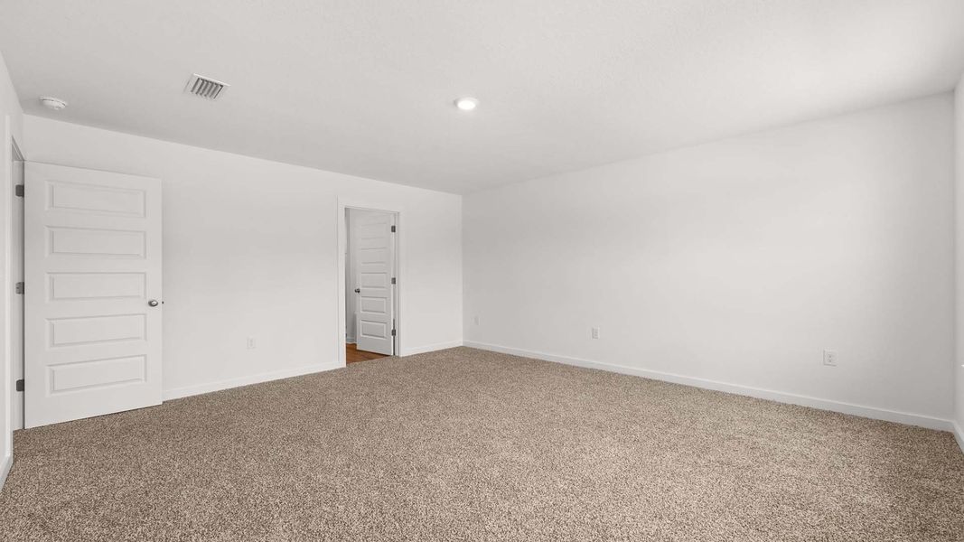 Spacious, unfurnished interior of a new home in Magnolia at the Bluffs Phase 3, Freeport (Image 19).