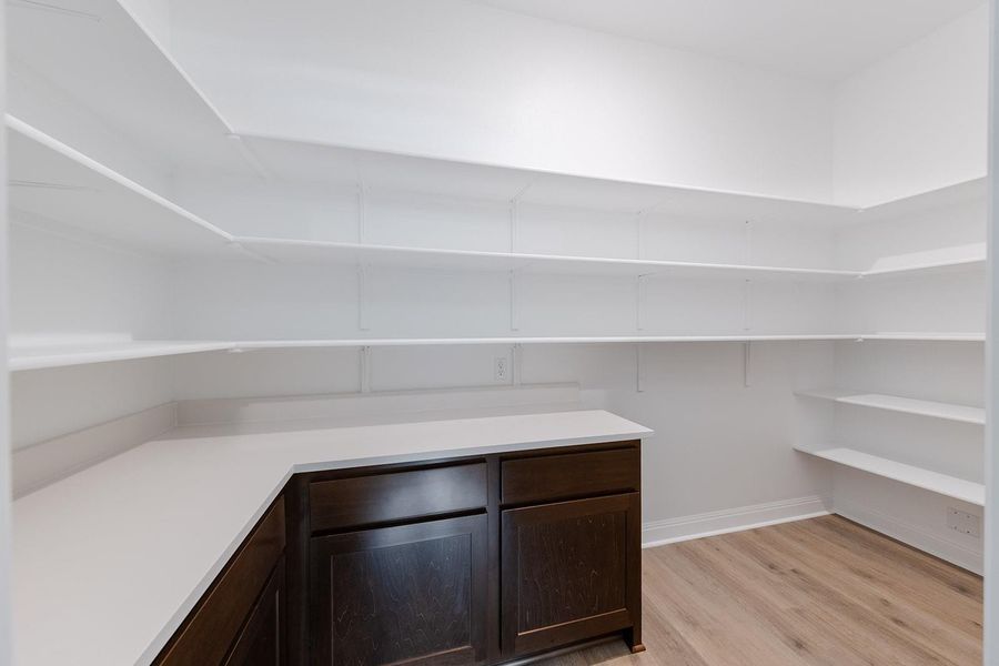 Spacious, unfurnished interior of a new home in Lariat - 80', Liberty Hill (Image 23). Spacious, unfurnished interior of a new home in Lariat - 80', Liberty Hill (Image 23).