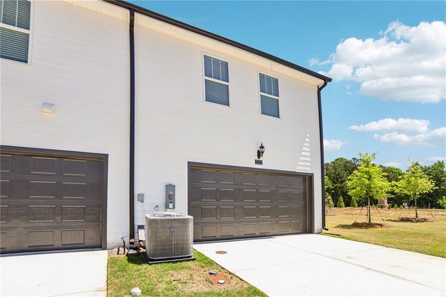 Exterior details and patio area of a home in Avalon - Vista Series, Conyers (Image 3).