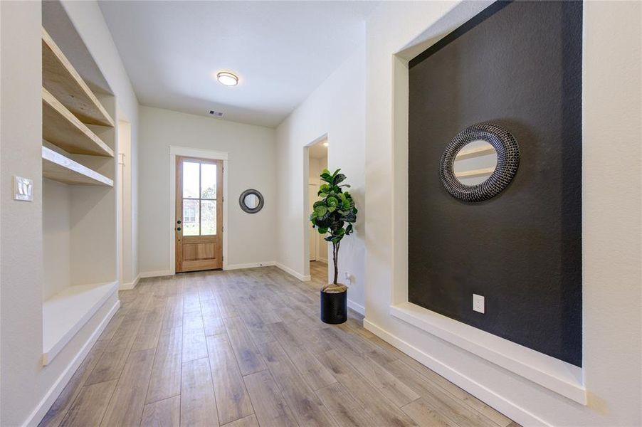 Wood-like tile around the home. No carpet.