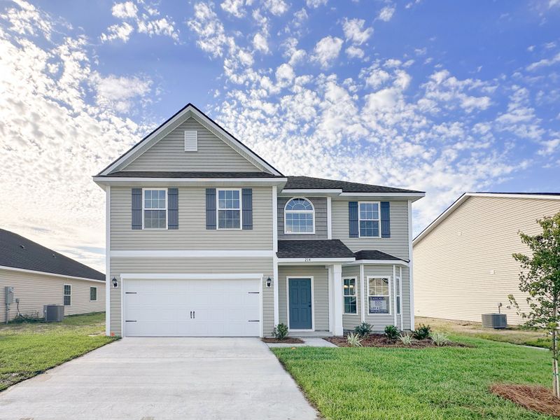 Front exterior of a new home in Tranquil South, Hinesville, GA, highlighting curb appeal (Image 1). Front exterior of a new home in Tranquil South, Hinesville, GA, highlighting curb appeal (Image 1).