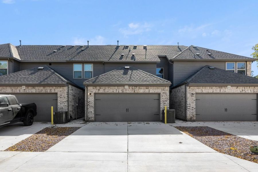 Representative exterior photo of a completed home built from the Whitney by Impression Homes in Timber Ridge, Corinth, TX (Image 25).