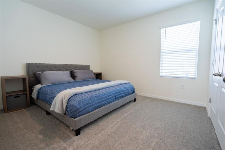 Furnished interior view inside a new home in Harmony at Lake Eloise, Winter Haven (Image 27).