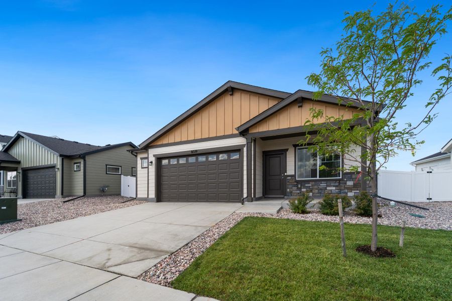 Front exterior of a new home in Union Colony West, Greeley, CO, highlighting curb appeal (Image 27).