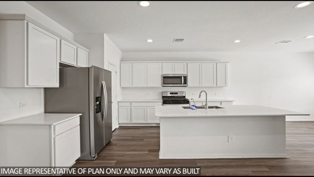 Representative furnished interior of a home built from the Midland by D.R. Horton in Sunterra, Katy (Image 7).