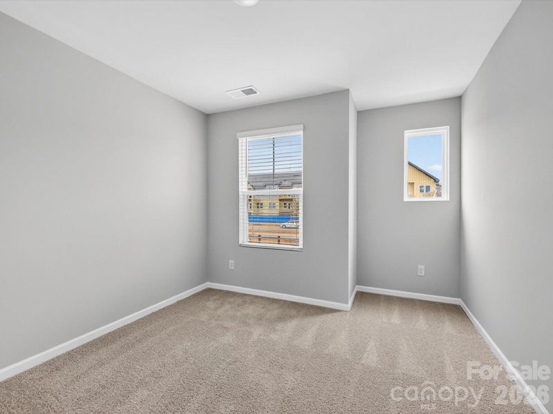Spacious, unfurnished interior of a new home in North Creek Village, Huntersville (Image 29).