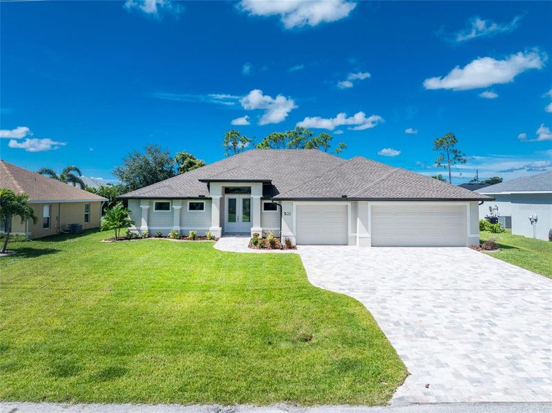 Front exterior of a new home in , Rotonda West, FL, highlighting curb appeal (Image 16).