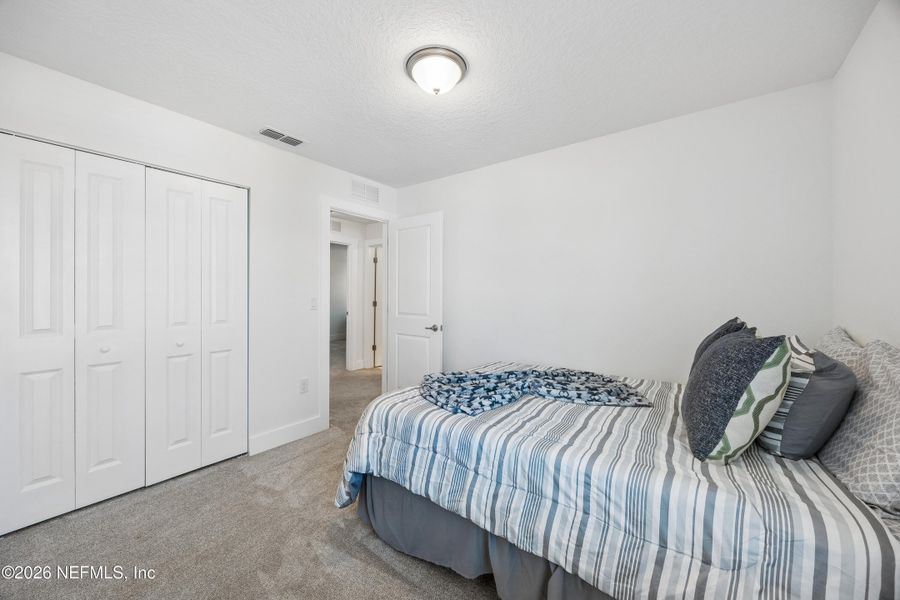 Furnished interior view inside a new home in Cordova Palms, St. Augustine (Image 19).