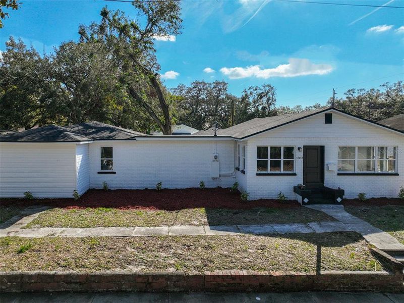 Front exterior of a new home in , Tampa, FL, highlighting curb appeal (Image 1). Front exterior of a new home in , Tampa, FL, highlighting curb appeal (Image 1).