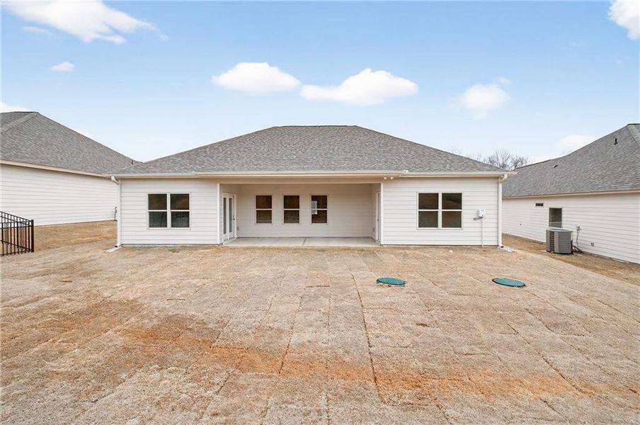 Exterior details and patio area of a home in , Homer (Image 2). Exterior details and patio area of a home in , Homer (Image 2).
