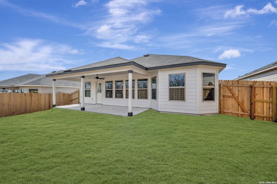Exterior details and patio area of a home in Greenspoint Heights, Seguin (Image 18).