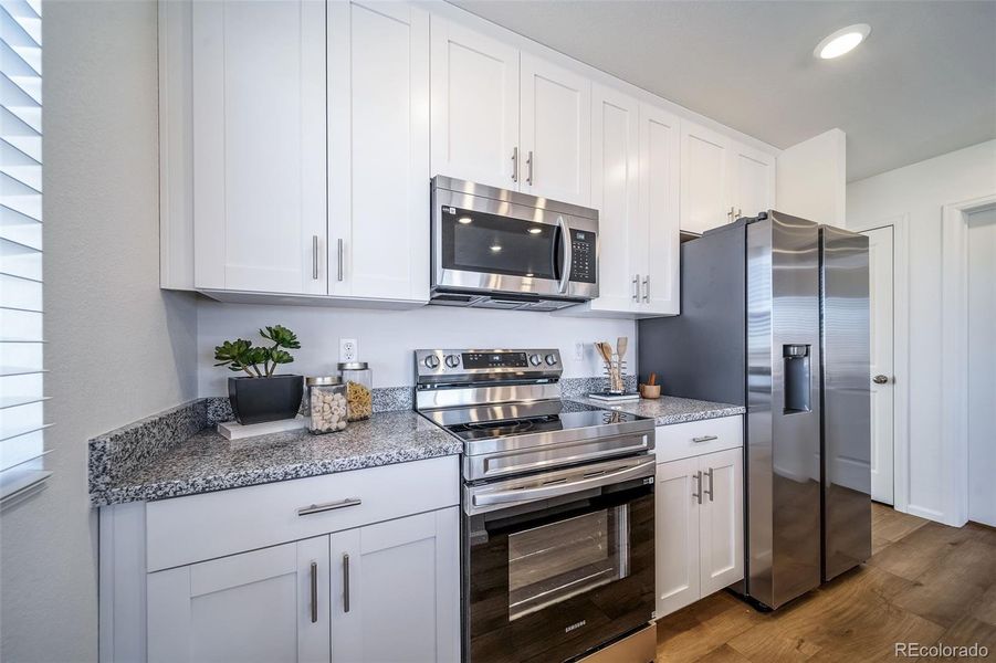 Furnished interior view inside a new home in , Commerce City (Image 32).