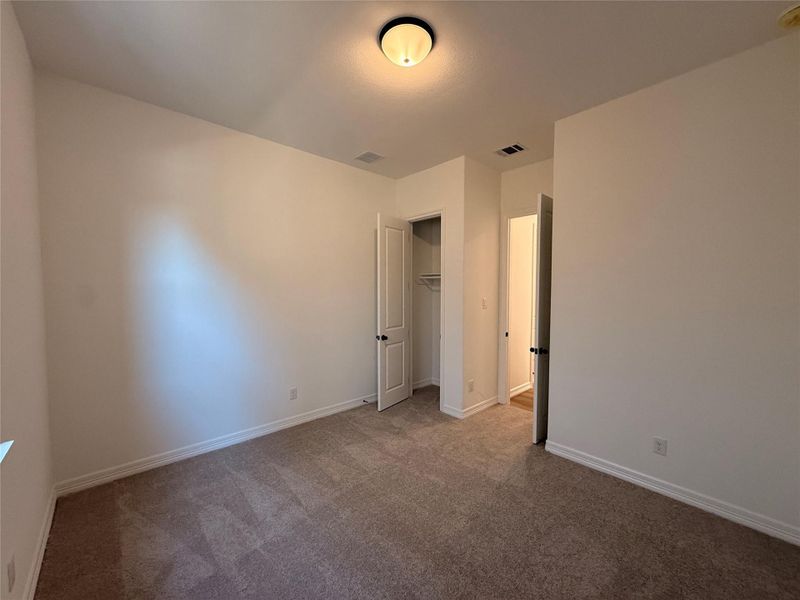 Spacious, unfurnished interior of a new home in Wildrye, Waller (Image 27).