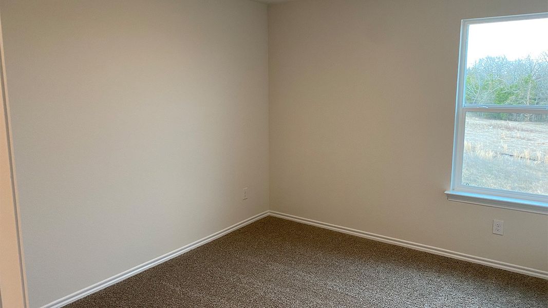 Spacious, unfurnished interior of a new home in Creeks at Burnett Trail, Canton (Image 21).