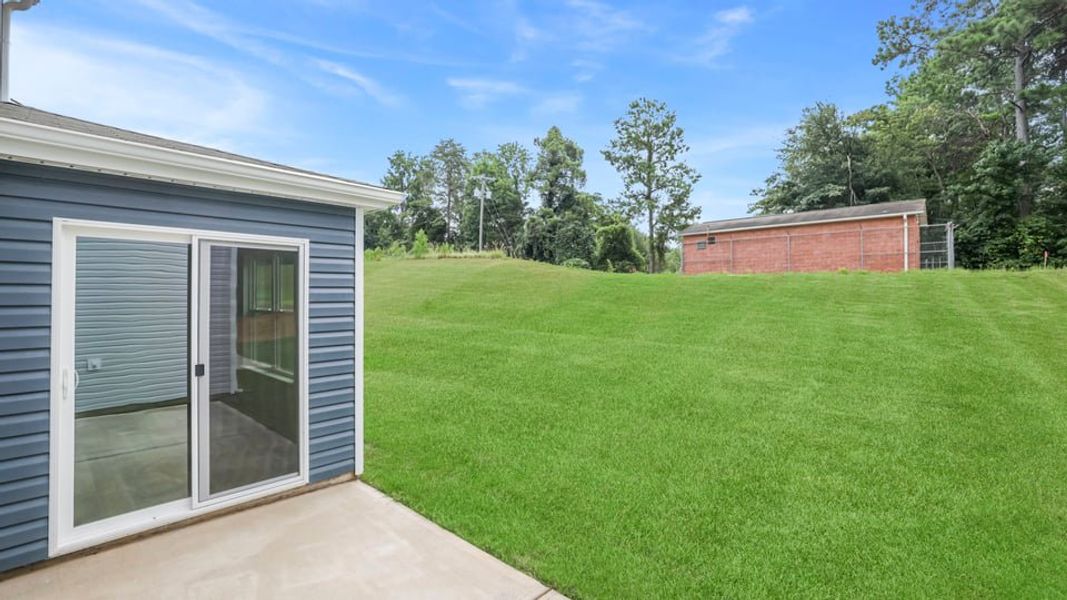 Exterior details and patio area of a home in Gibson Grove, Laurens (Image 22).