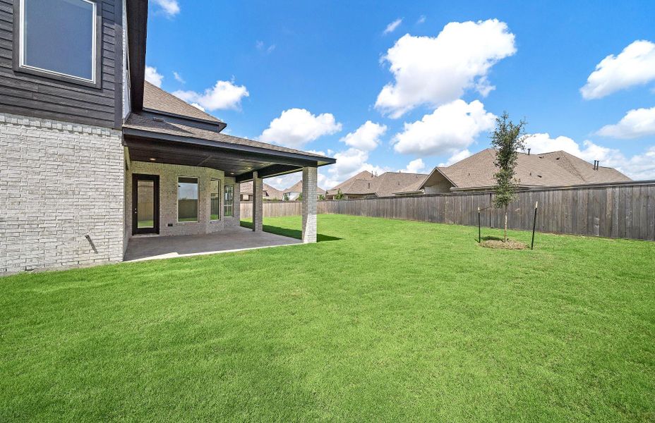 Exterior details and patio area of a home in Bridgeland 60′, Cypress (Image 2). Exterior details and patio area of a home in Bridgeland 60′, Cypress (Image 2).