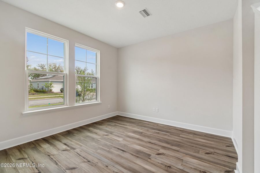 Spacious, unfurnished interior of a new home in Tributary 50', Yulee (Image 23).