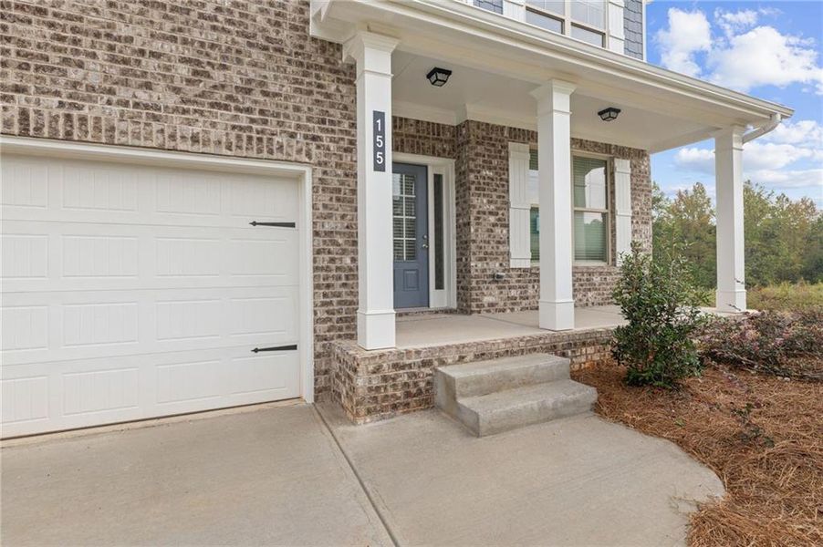 Exterior details and patio area of a home in Hellen Valley, Braselton (Image 3).