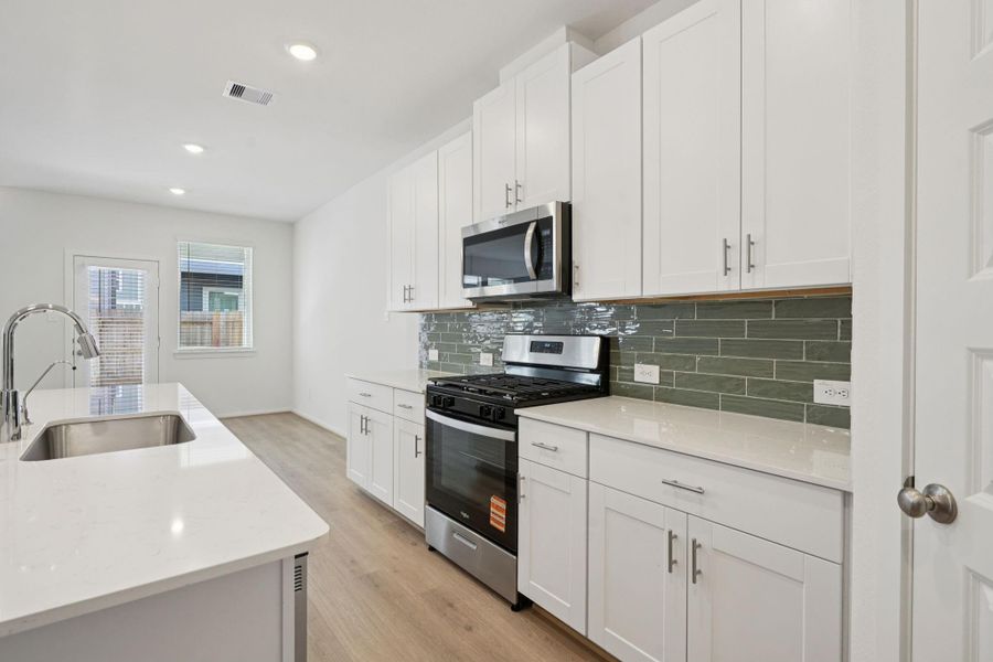 Furnished interior view inside a new home in Kemah Crossing - City Series, Kemah (Image 7).