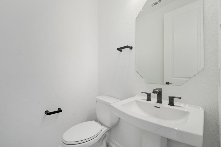 Furnished interior view inside a new home in Parkside on the River, Georgetown (Image 10).