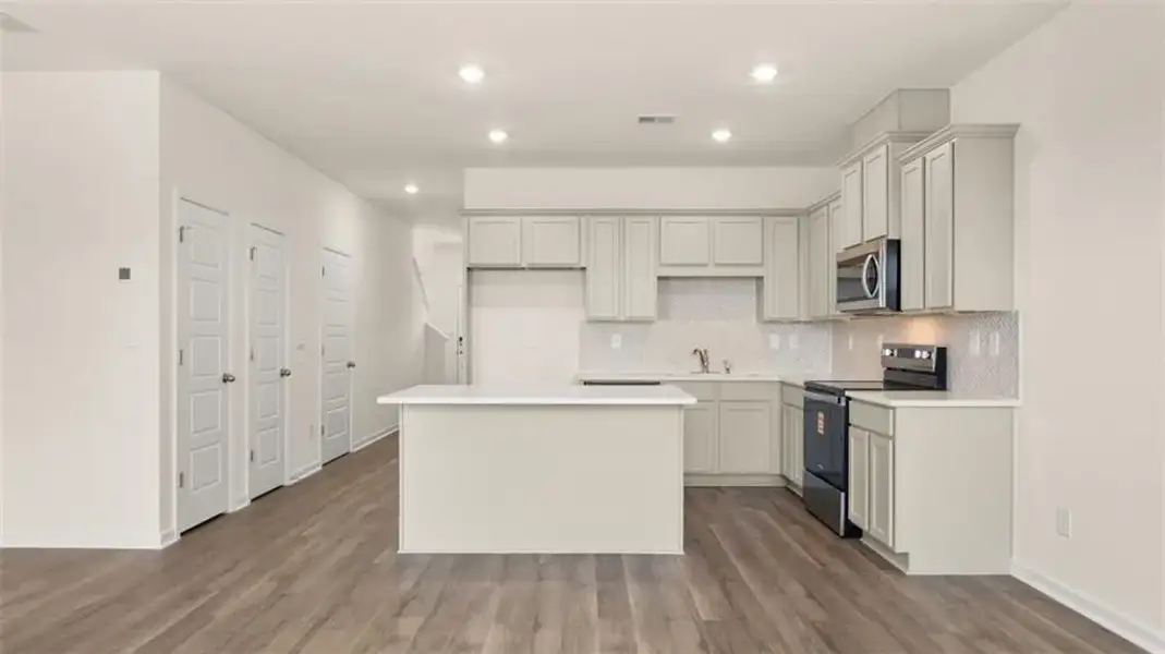 Furnished interior view inside a new home in The Gables at Agricultural Village, Perry (Image 6).