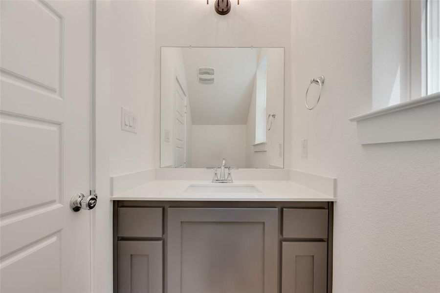 Bathroom featuring vanity Bathroom featuring vanity