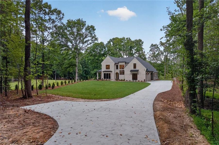 Front exterior of a new home in , Lawrenceville, GA, highlighting curb appeal (Image 29).