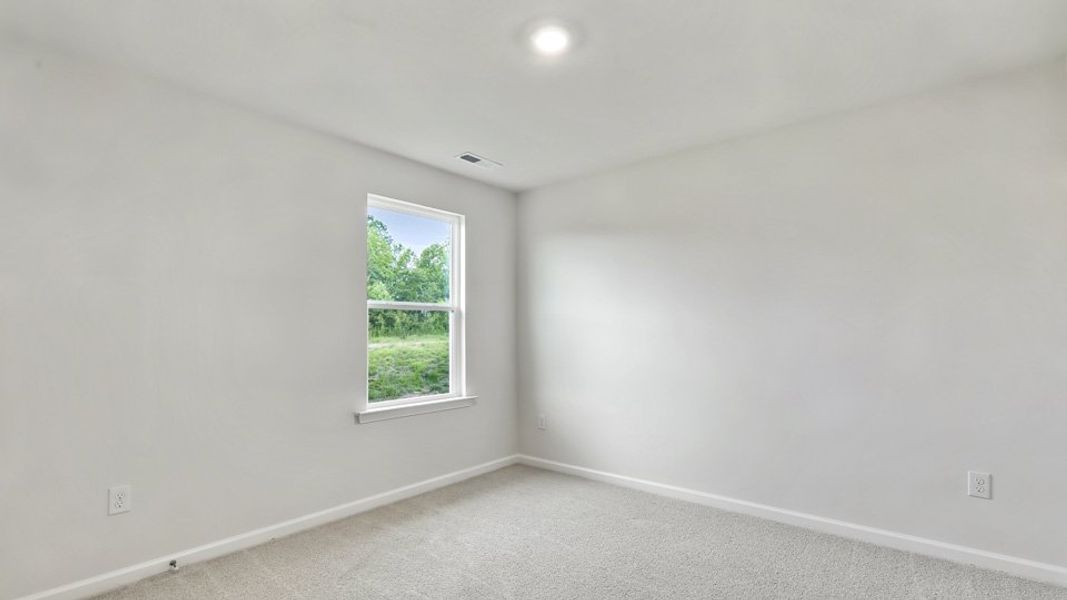 Representative unfurnished interior of a home built from the Robie by D.R. Horton in The Grove at Matthews Landing, Fuquay Varina (Image 25).