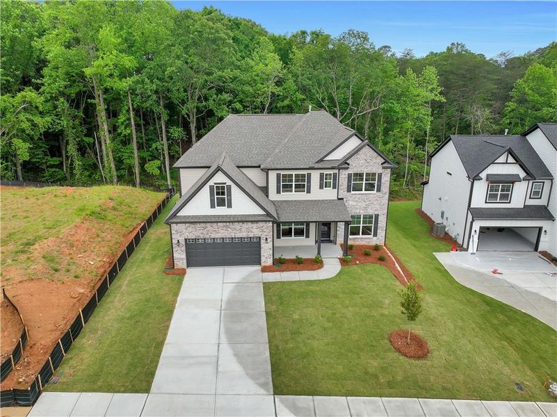 Front exterior of a new home in Arbor West, Dawsonville, GA, highlighting curb appeal (Image 29).