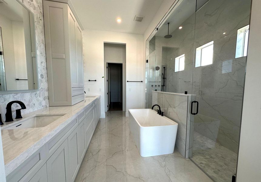 Front exterior of a new home in Bridgewater, Jupiter, FL, highlighting curb appeal (Image 5).