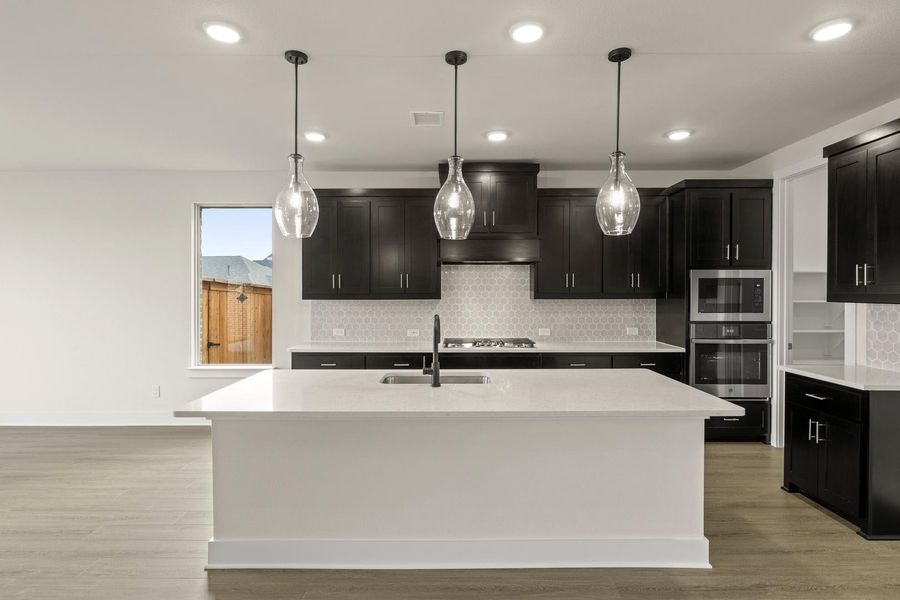 Representative furnished interior of a home built from the Davis by Tri Pointe Homes in Somerset Park, Rockwall (Image 7).