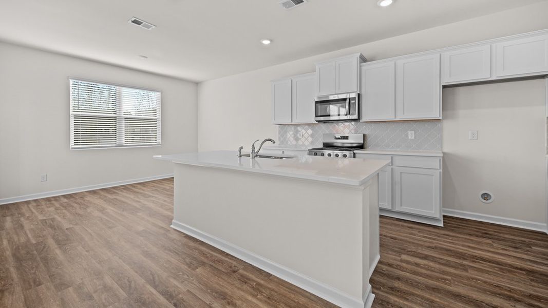 Representative furnished interior of a home built from the Edmon by D.R. Horton in Poplar Preserve, Newnan (Image 6).