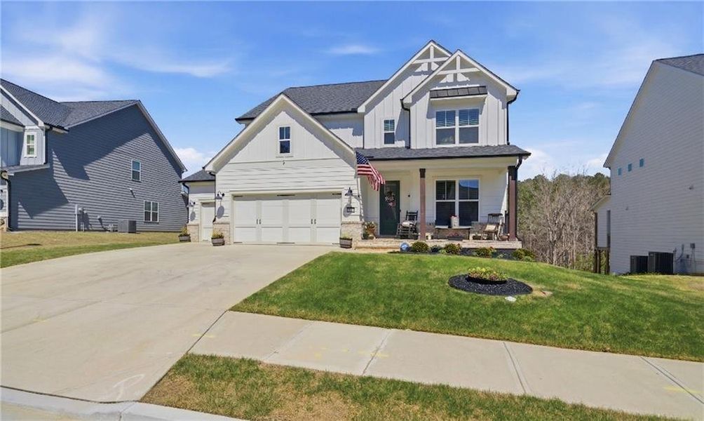 Front exterior of a new home in , Dallas, GA, highlighting curb appeal (Image 23).