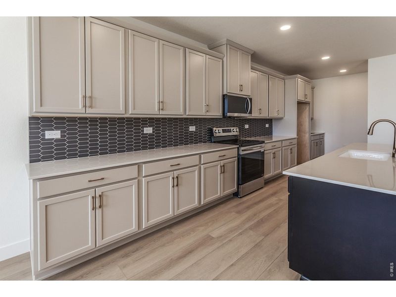 Furnished interior view inside a new home in Prairie Song Story Collection - Single Family Homes, Windsor (Image 6).