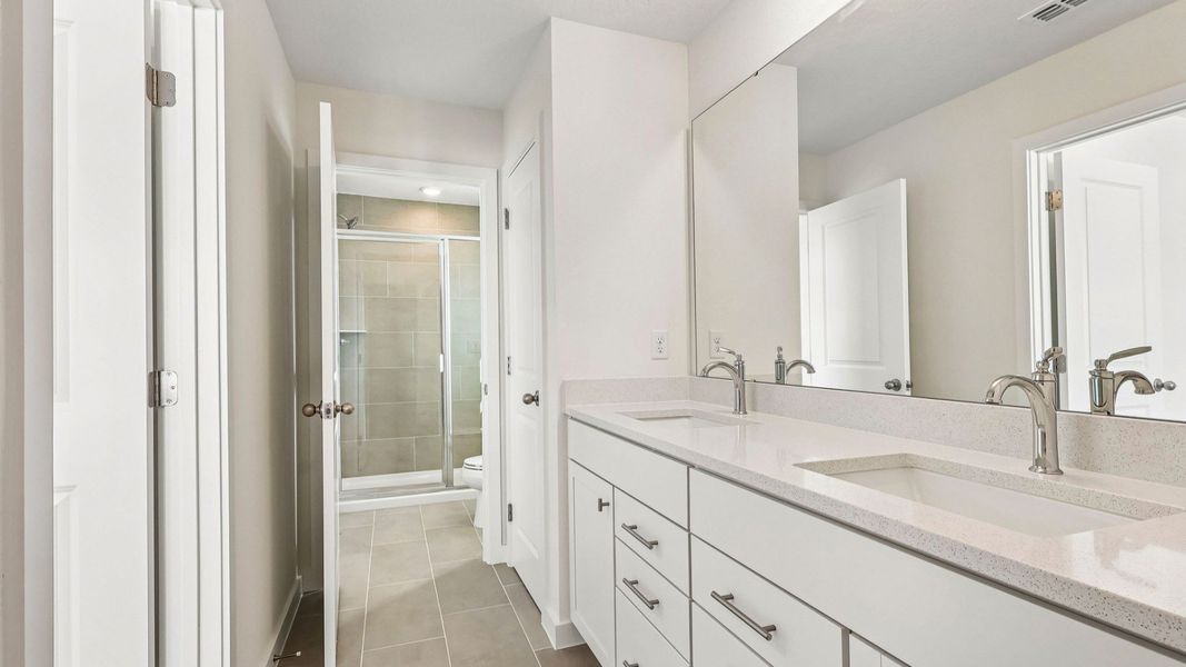 Furnished interior view inside a new home in Cyrene at Harmony, St. Cloud (Image 26).