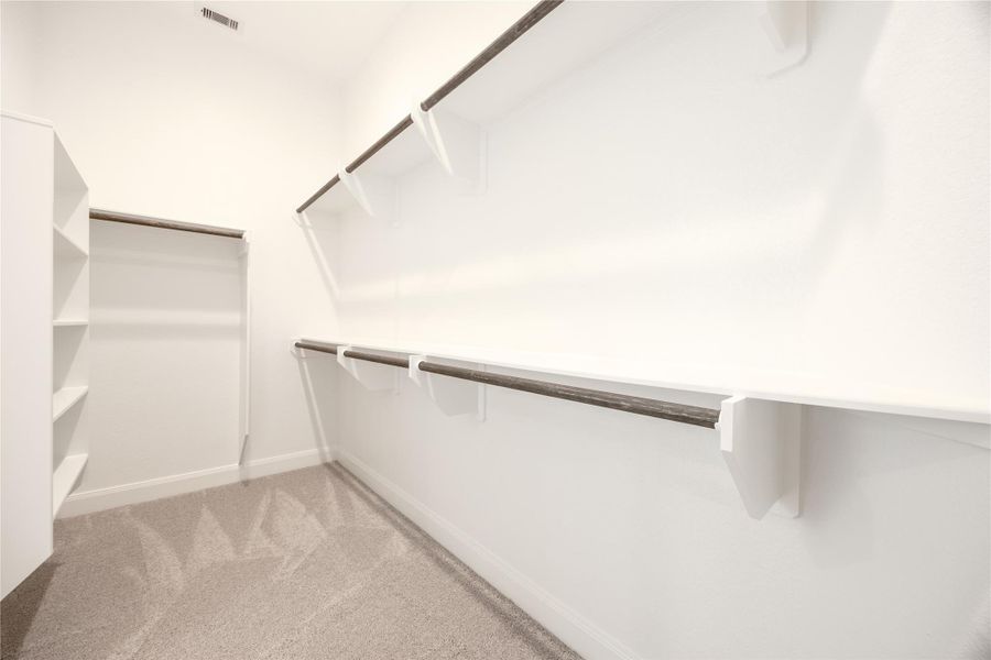 Spacious, unfurnished interior of a new home in Sunterra, Katy (Image 2). Spacious, unfurnished interior of a new home in Sunterra, Katy (Image 2).