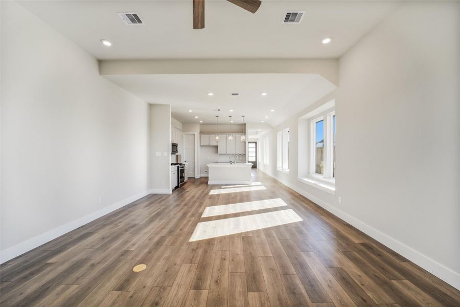 Spacious, unfurnished interior of a new home in Sunterra, Katy (Image 21).